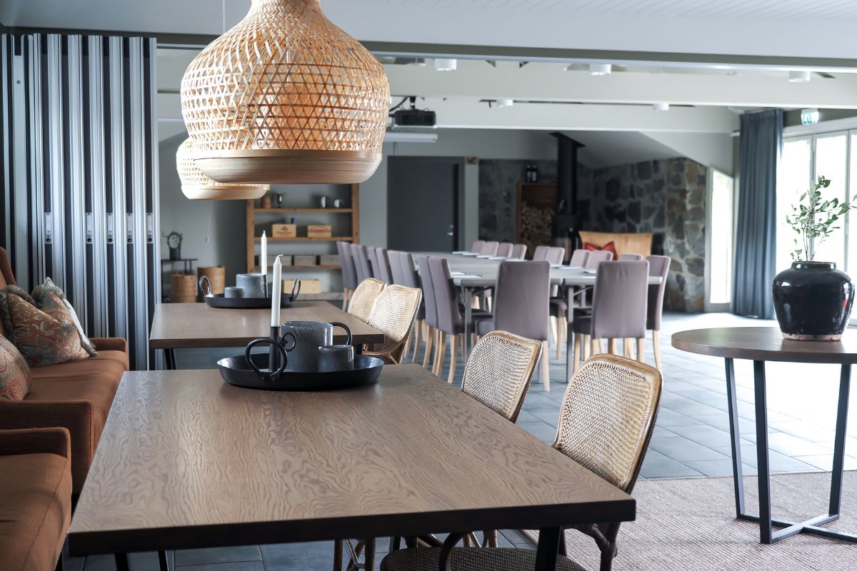 a dining room with a table and chairs