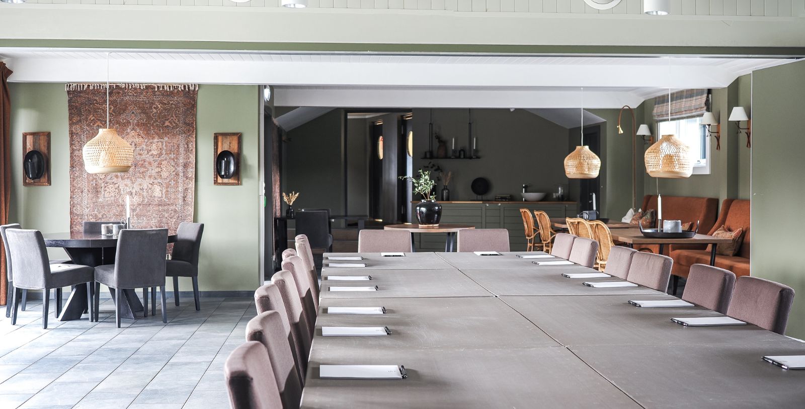 a room with a table and chairs