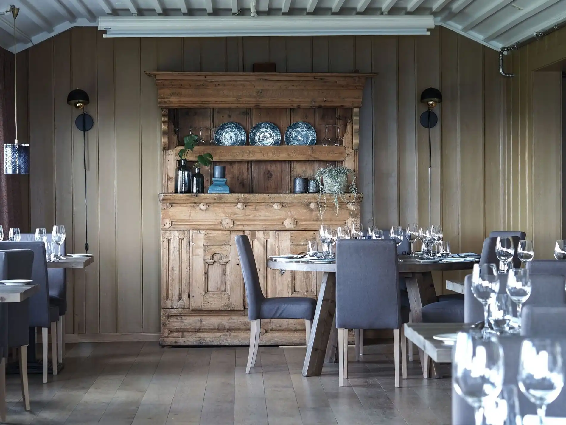 a room with a table and chairs