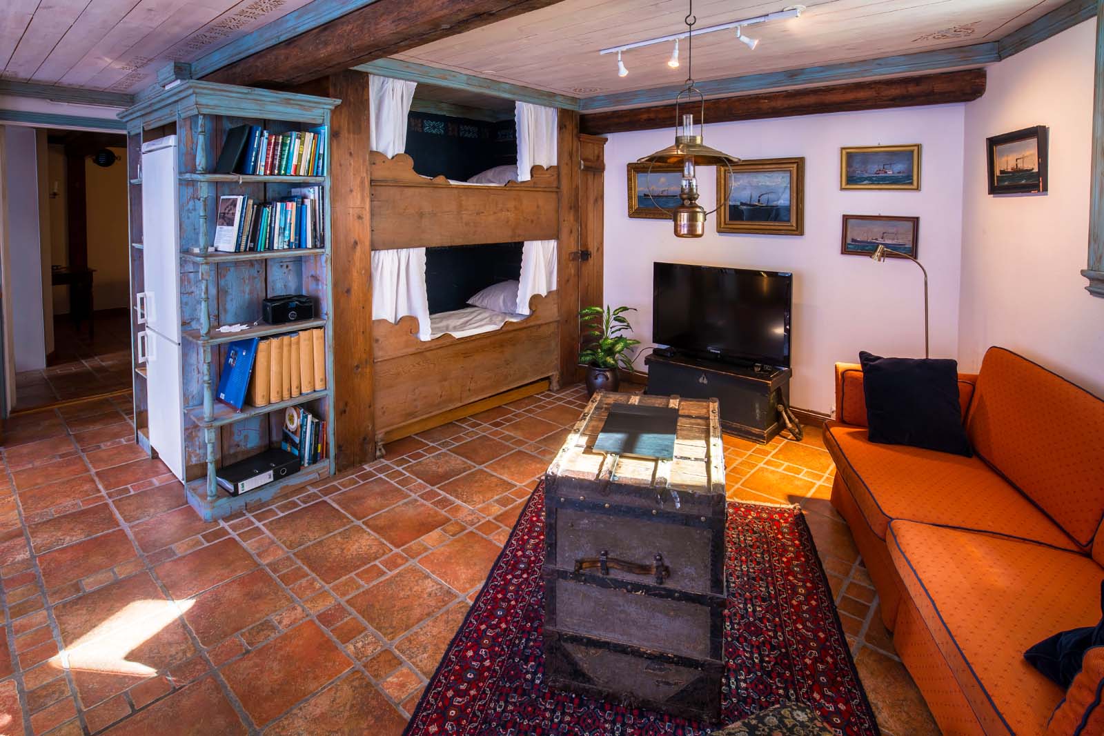 a room with a bunk bed and a couch