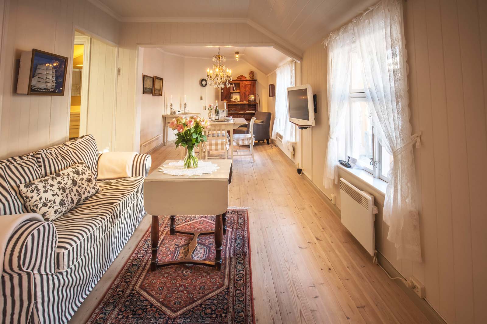 a living room with a couch and a table