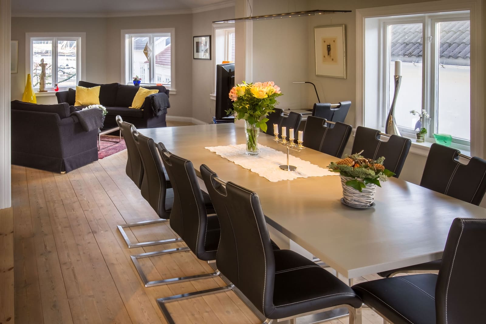 a dining room with a table and chairs