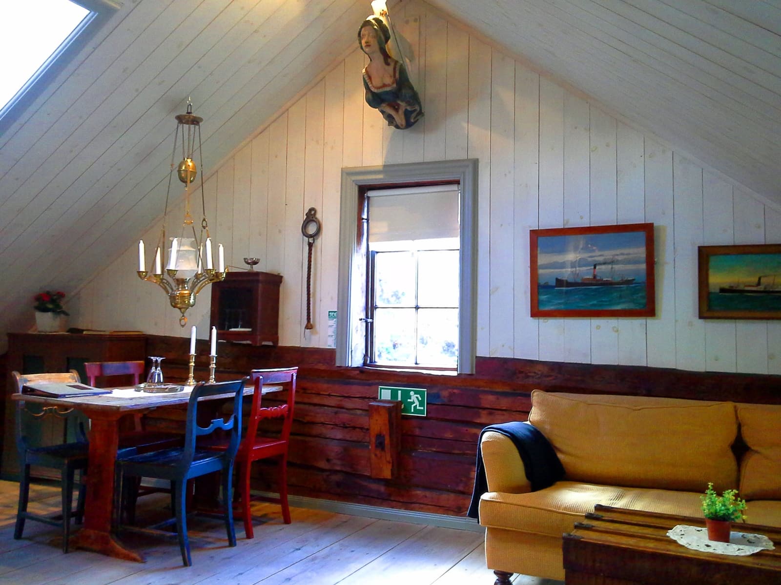 a room with a table and chairs
