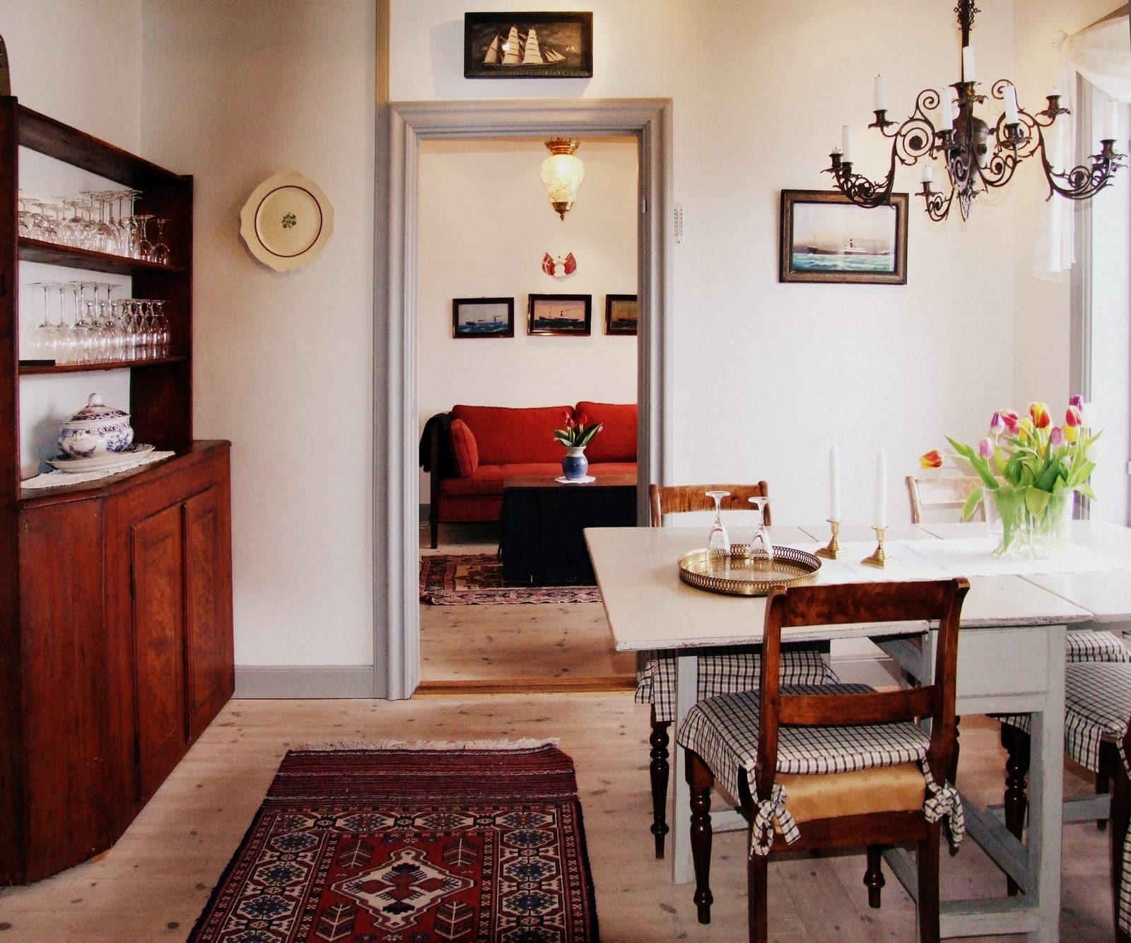 a dining room with a table and chairs