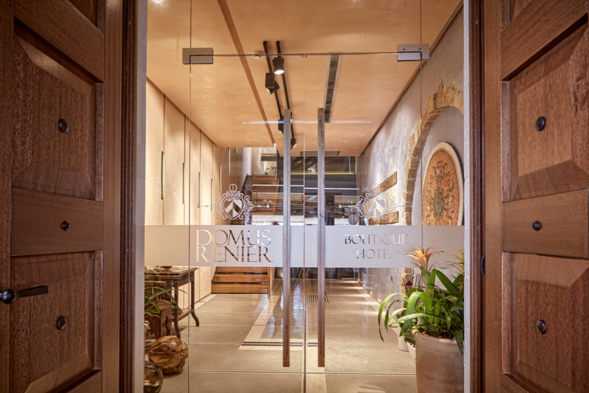 a glass door with a sign on it