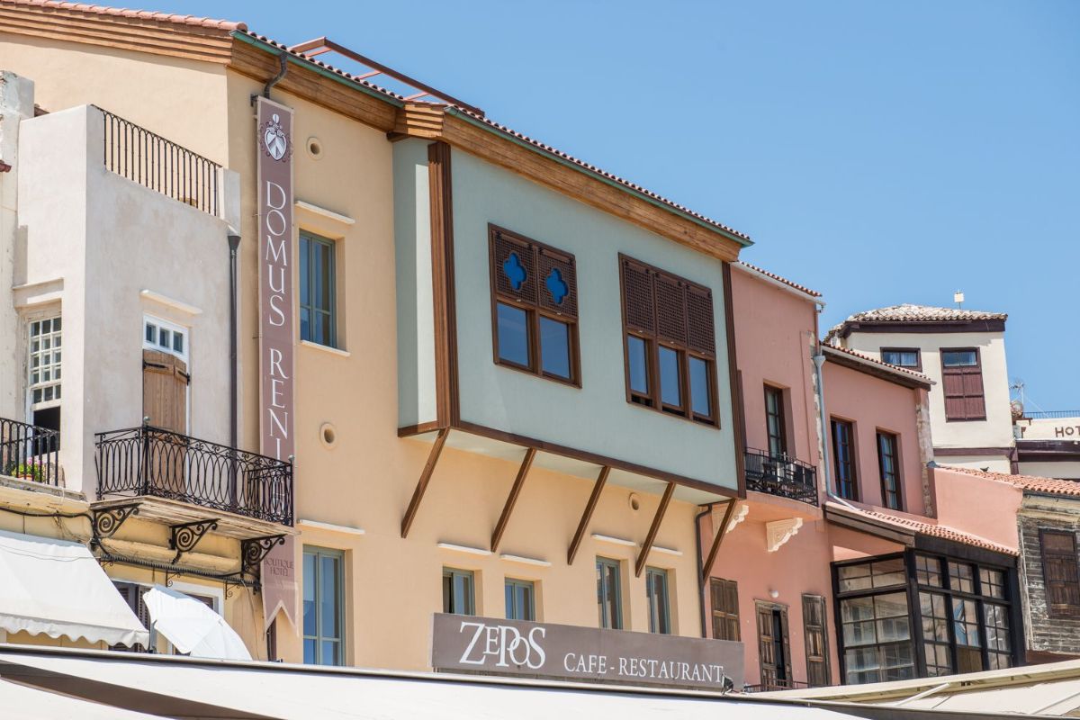 a group of buildings with a sign