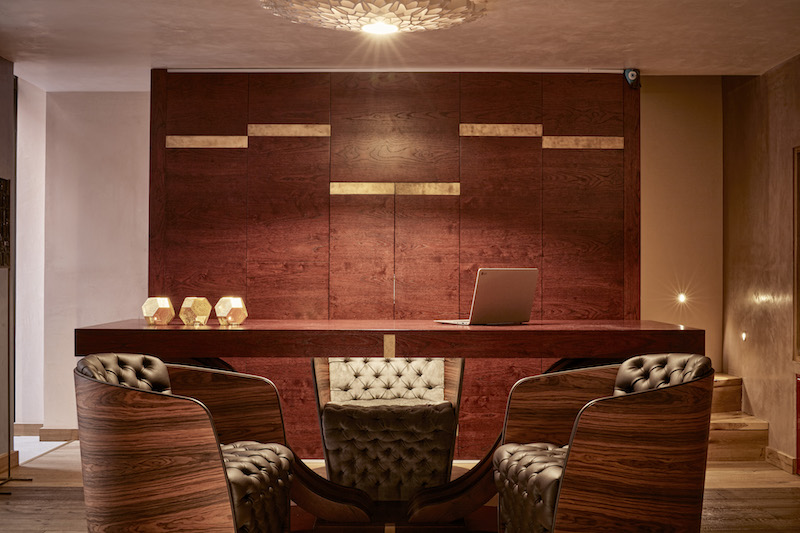 a room with a table and chairs