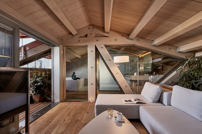 a living room with a couch and a table