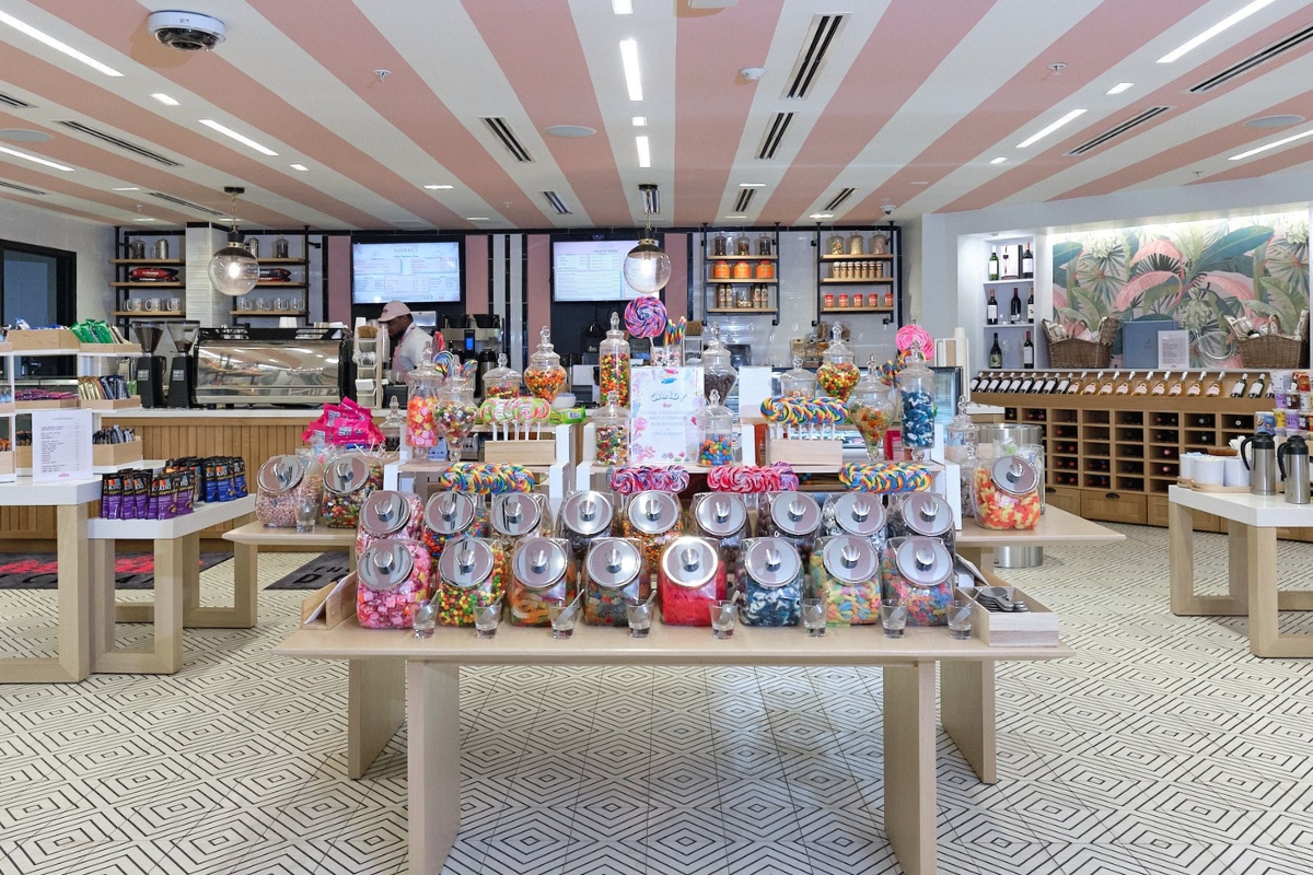 a candy store with many jars of candy