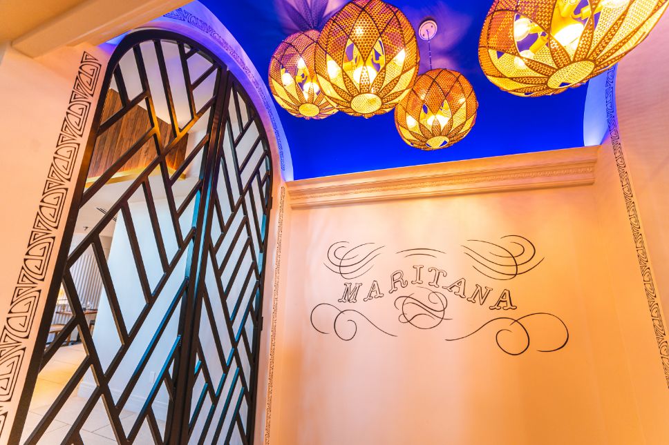 a ceiling with lights and a door