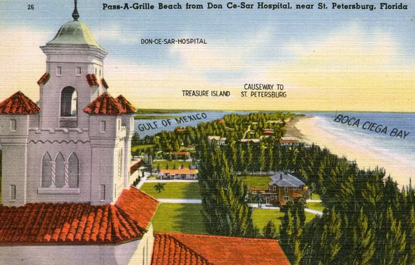 a building with a tower and a beach