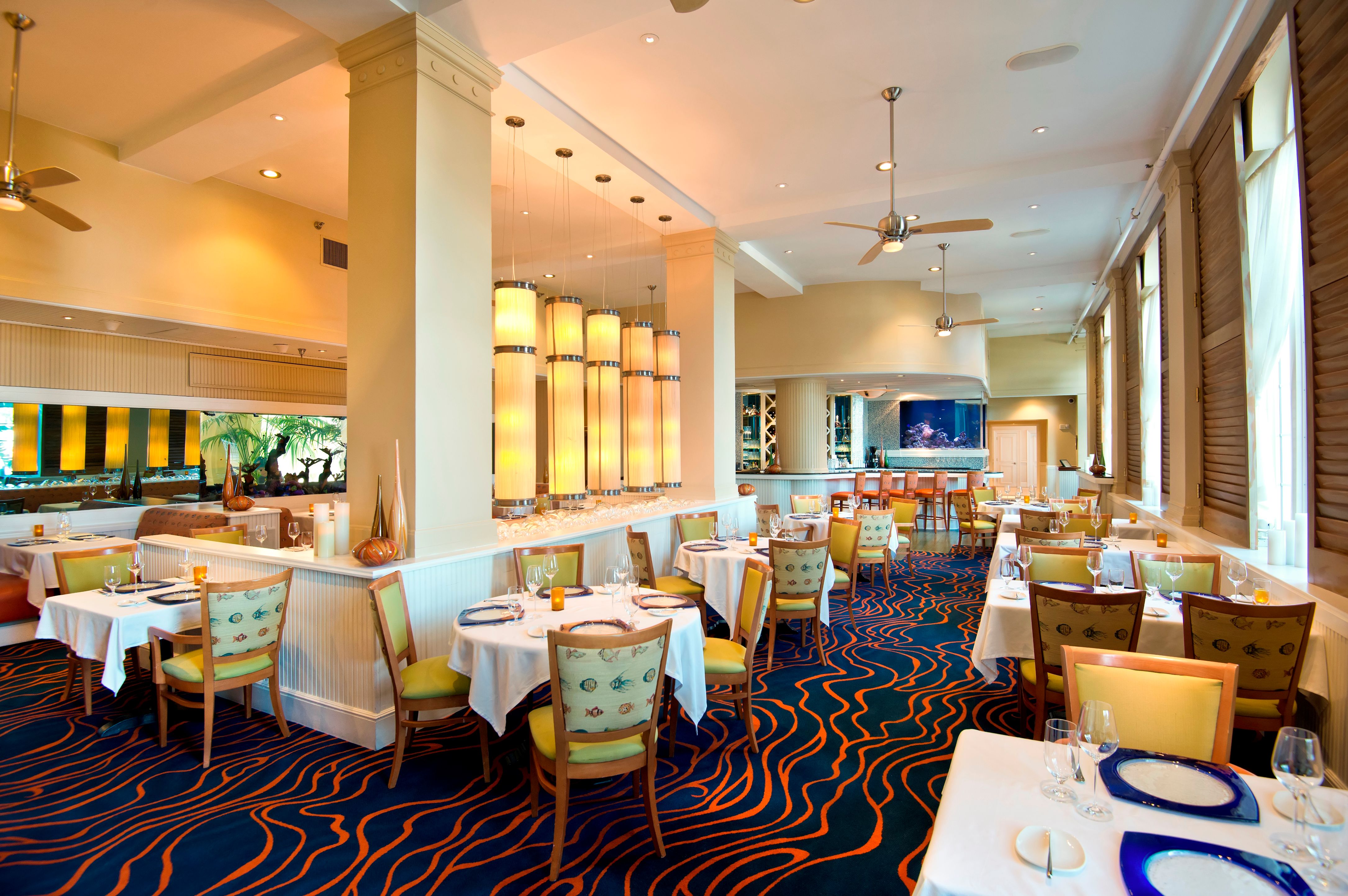 a restaurant with tables and chairs