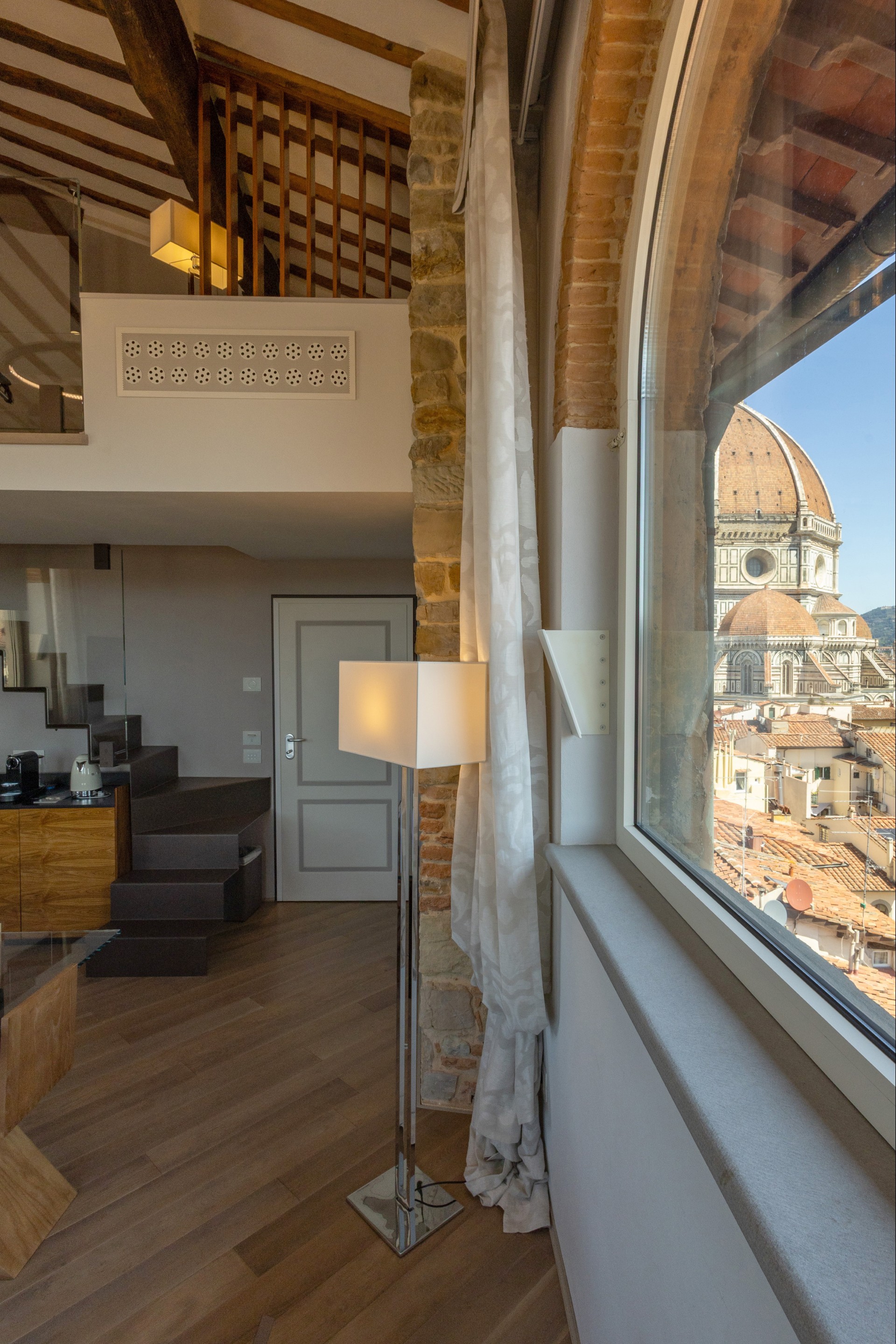 Image of a guestroom at Donati Luxury Tower Suites, 1000, a Member of Historic Hotels Worldwide in Florence, Italy.