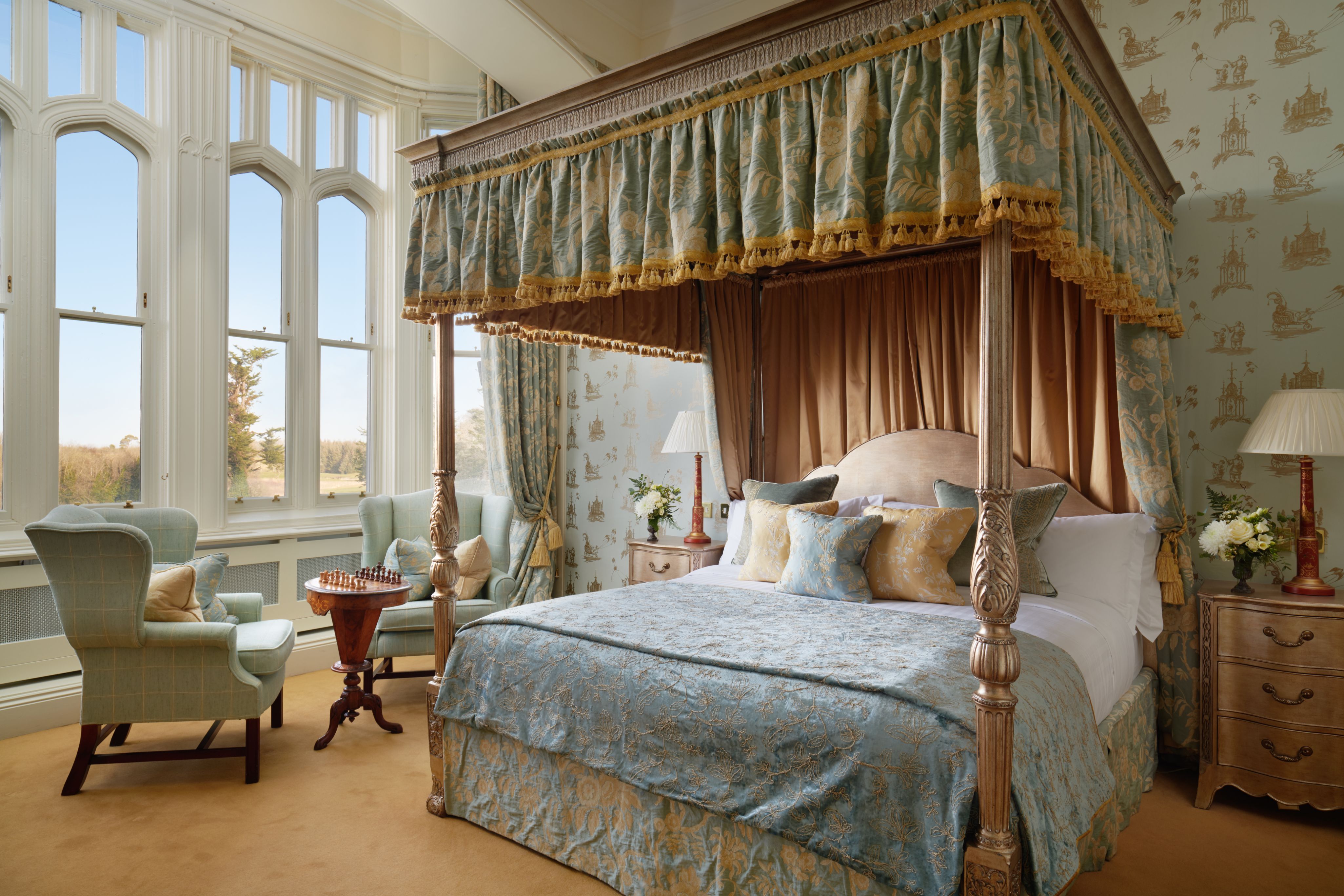 a large bed with a canopy over it