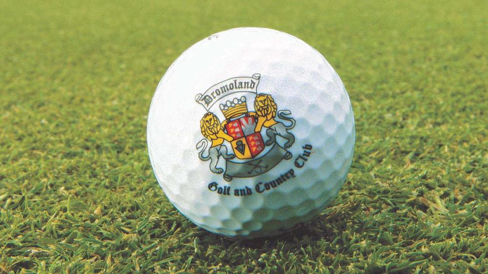 a golf ball on the grass