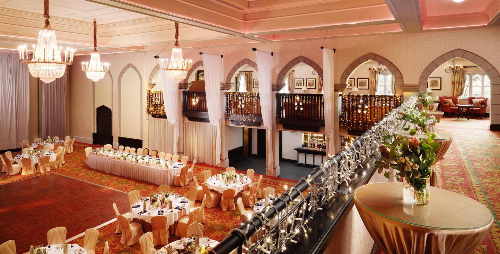 a room with tables and chairs
