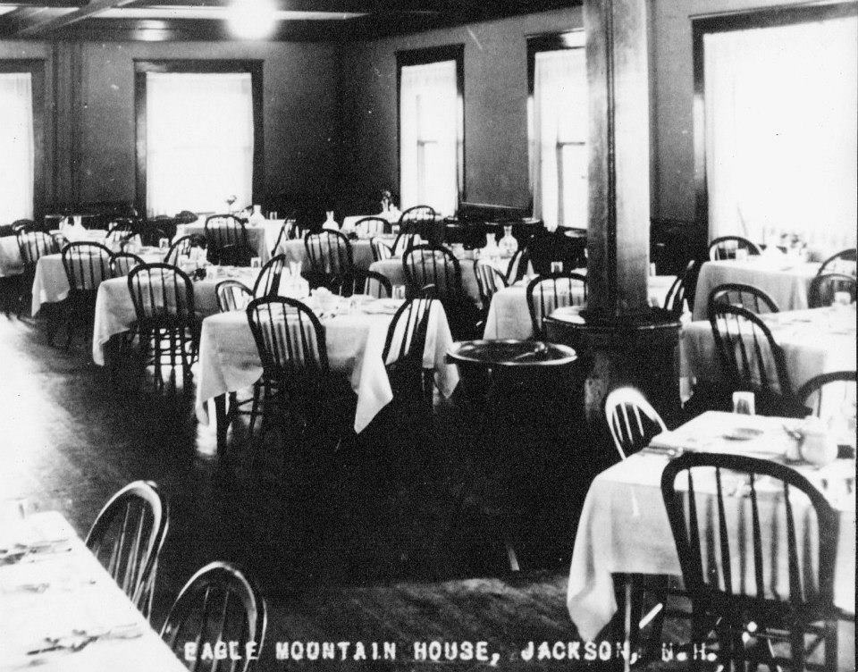 a restaurant with tables and chairs