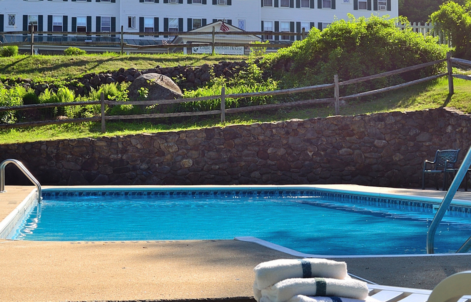 a pool with towels on it