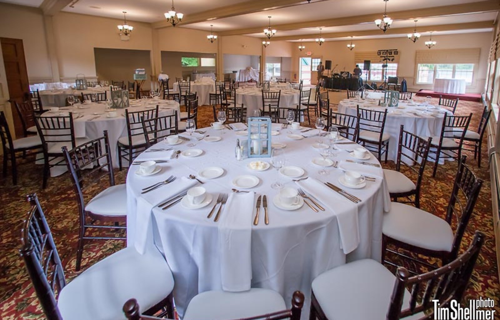 a room with tables and chairs