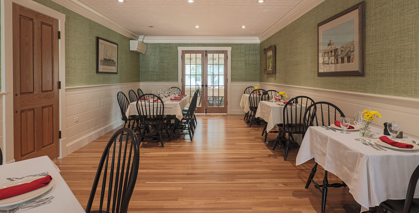 a room with tables and chairs