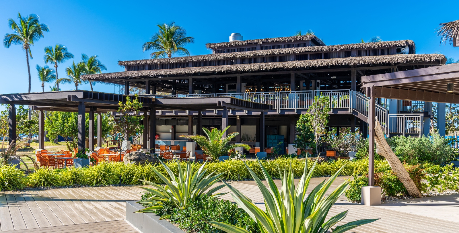 a building with a deck and a patio
