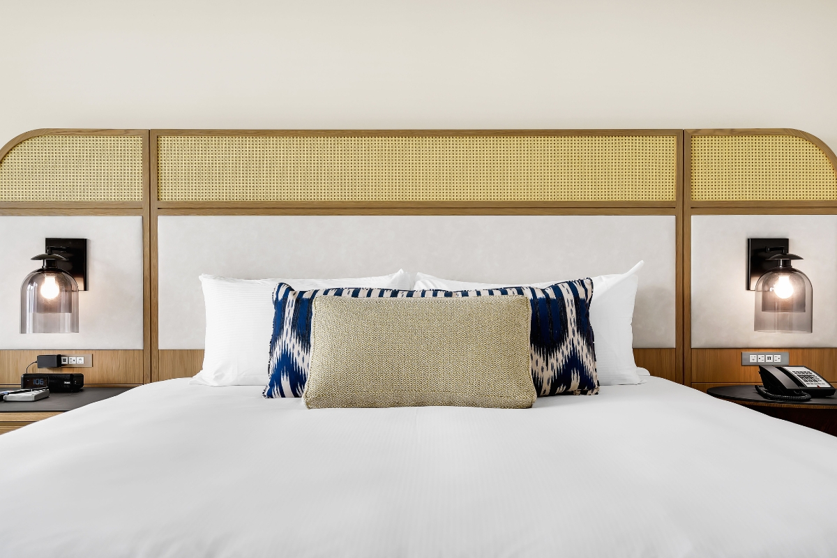 a bed with pillows on it