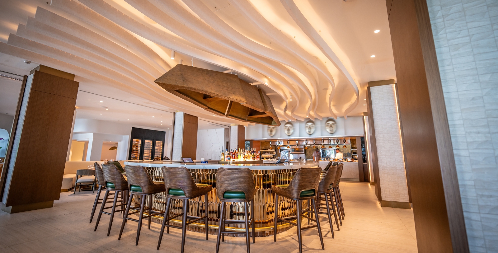 a bar with a round table and chairs