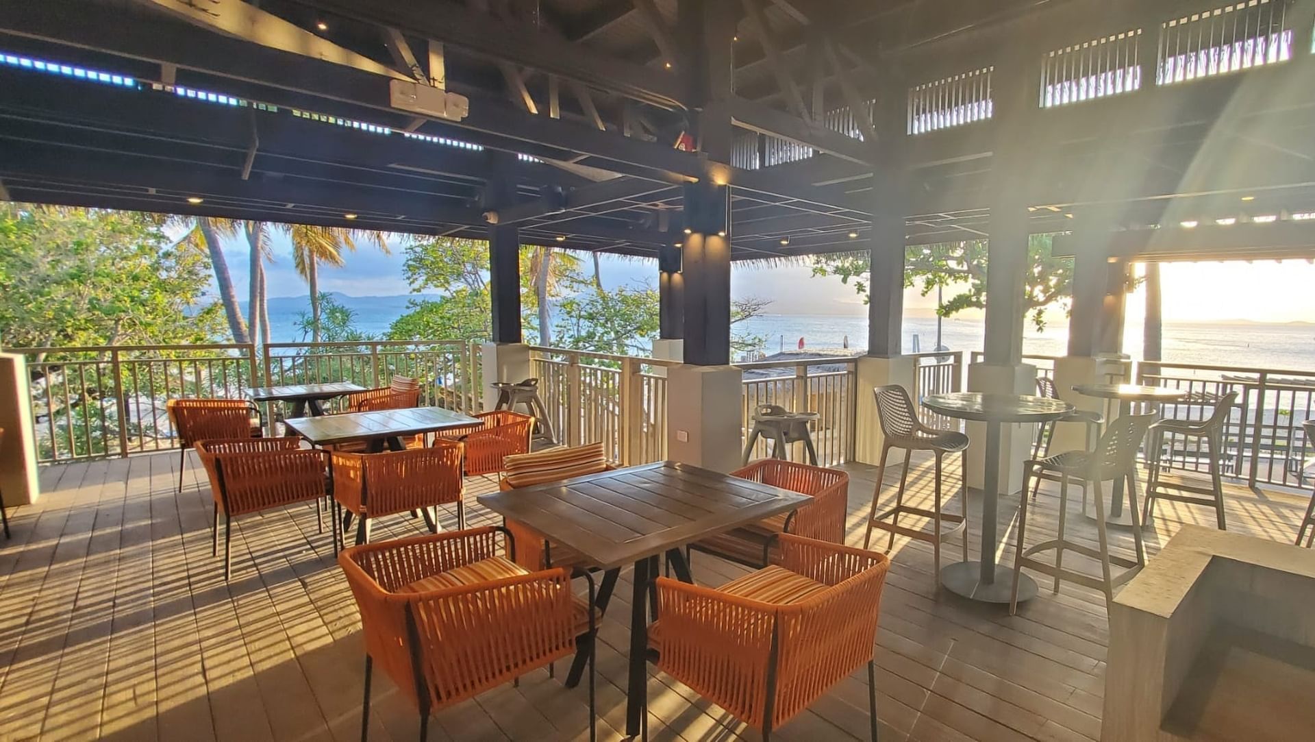 a restaurant with tables and chairs