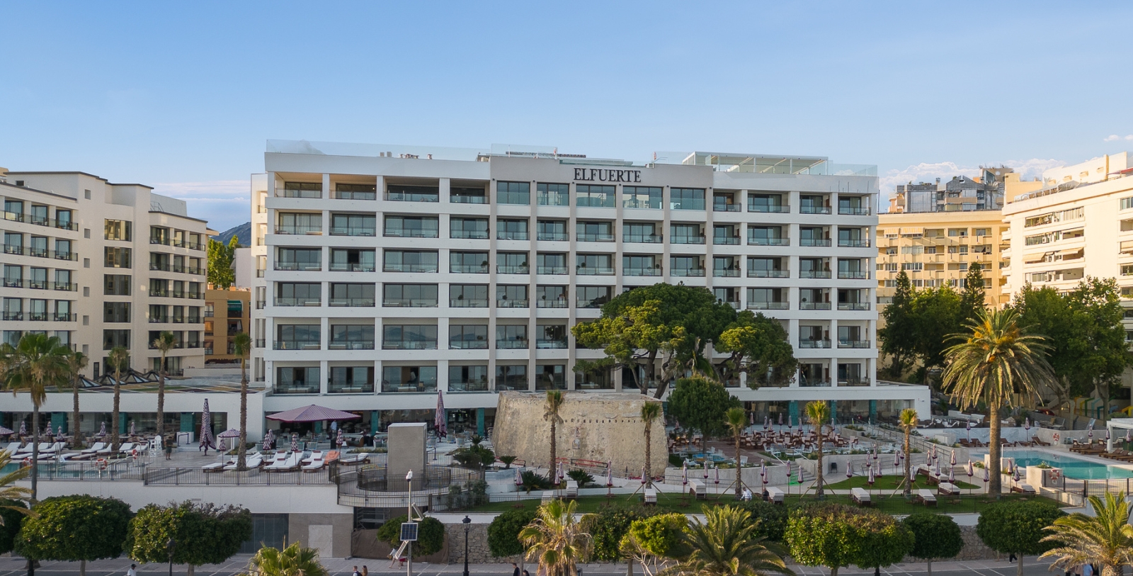 a large white building with many windows