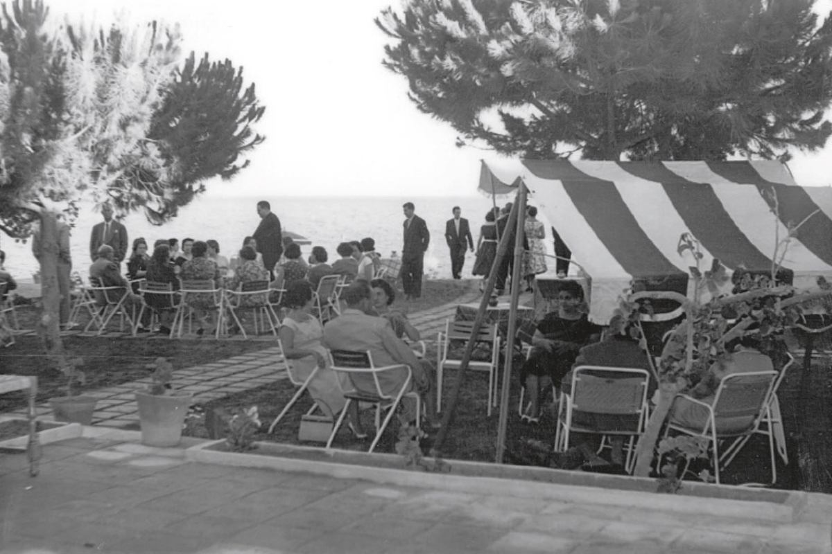 a group of people sitting outside