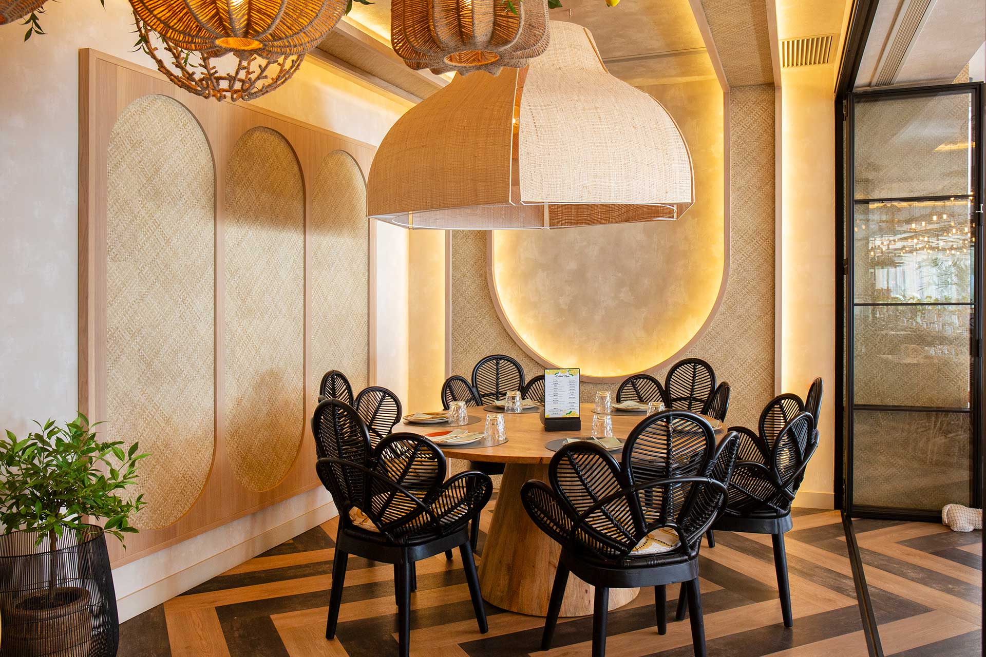 a table with chairs and a chandelier