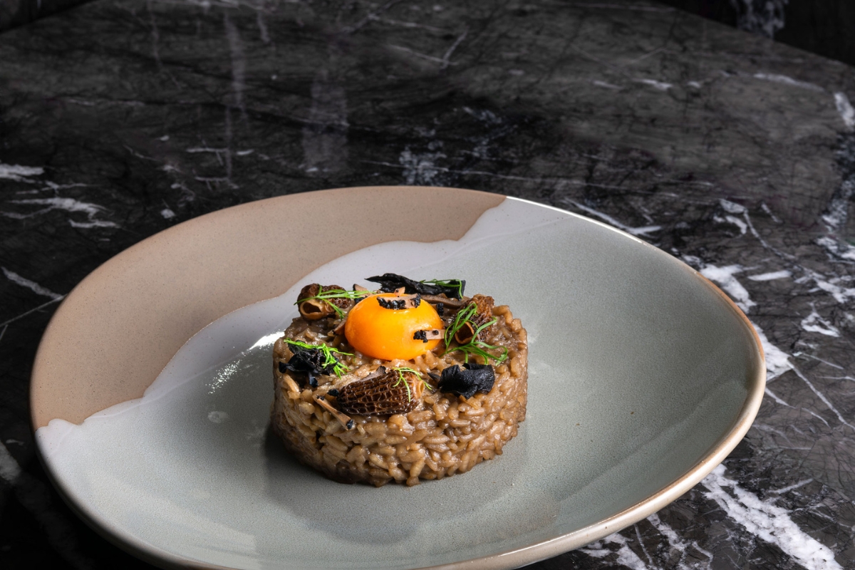 a plate of food on a marble surface