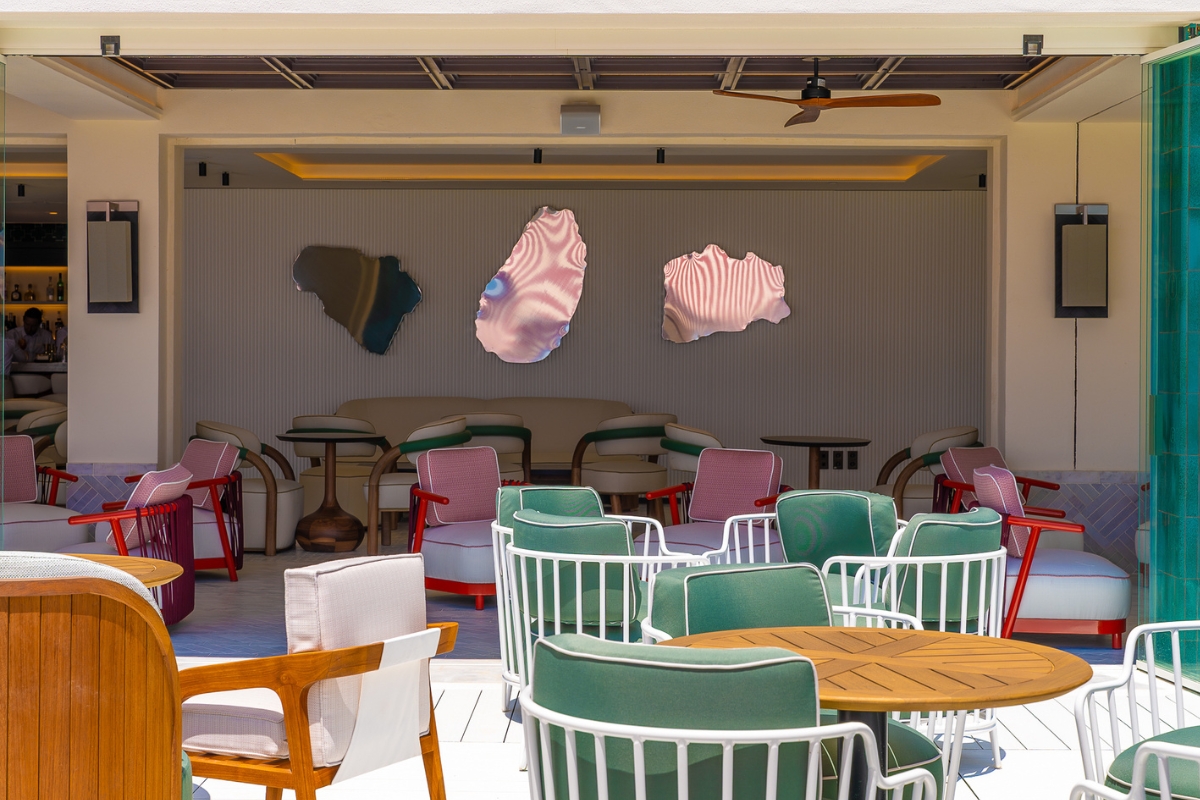 a patio with chairs and tables