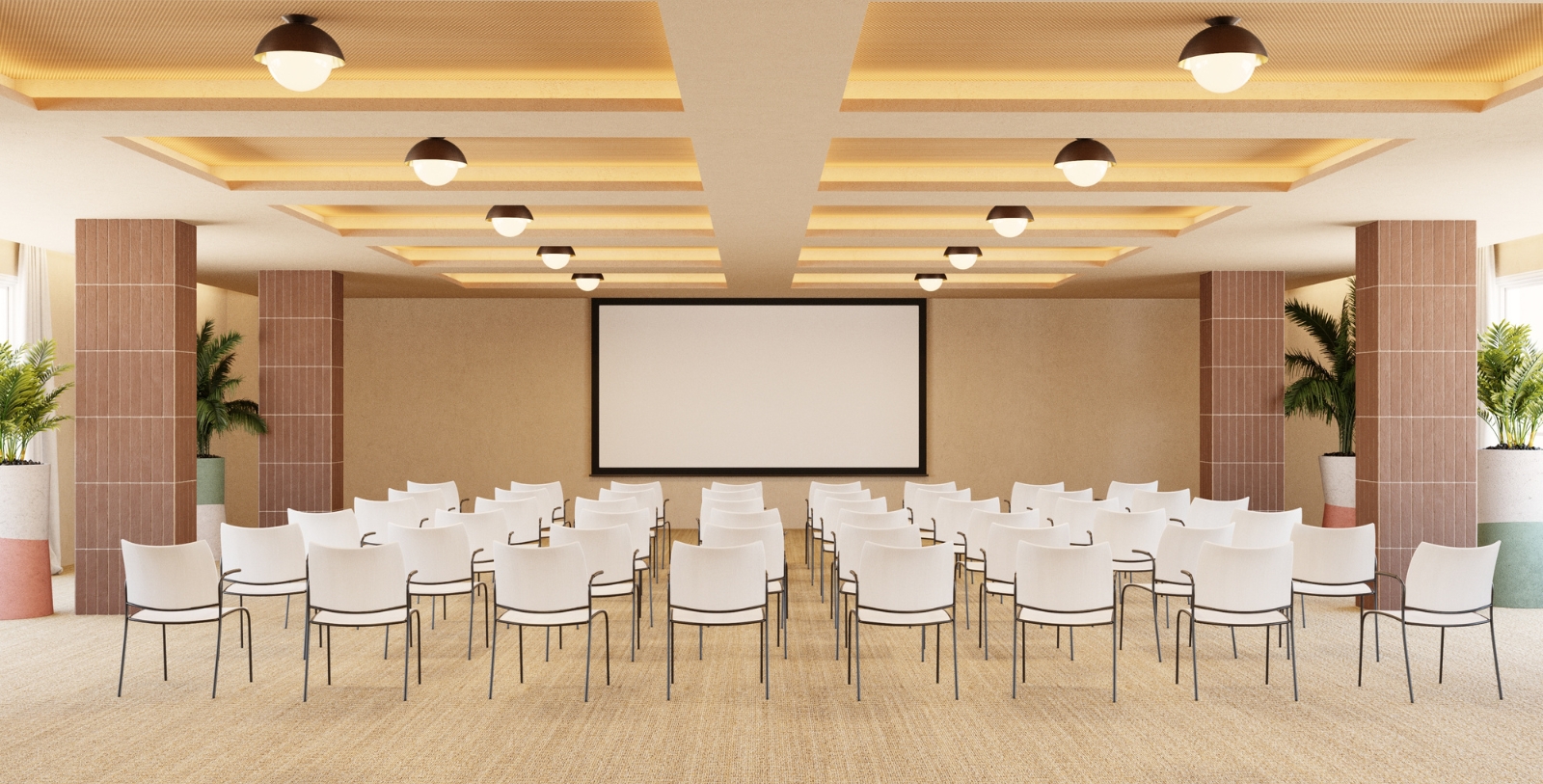a room with white chairs and a screen