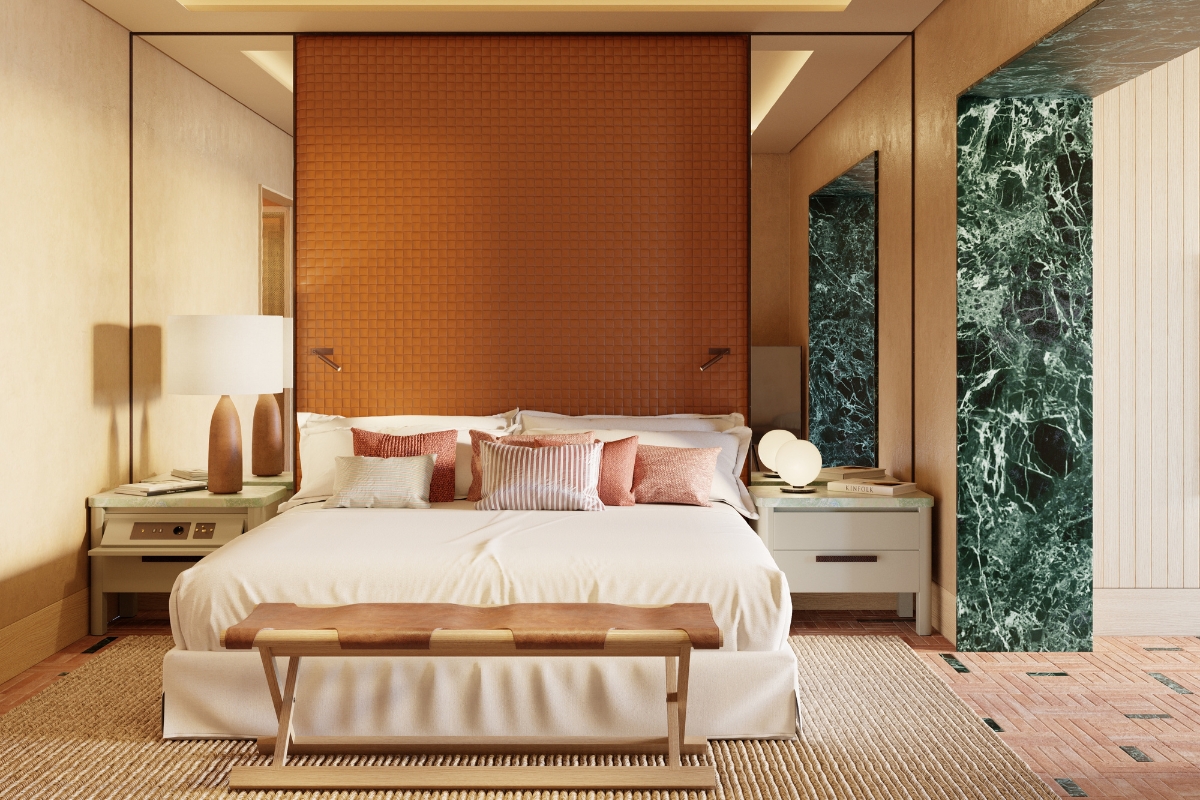 a bed with white bedding and a white lamp