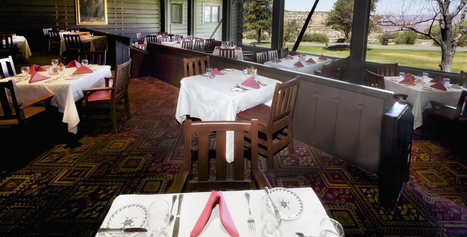 a restaurant with tables and chairs