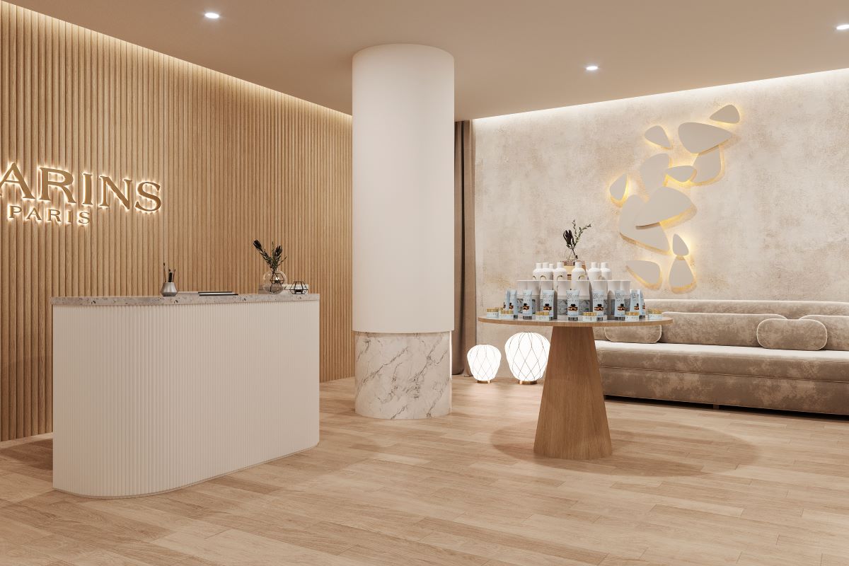 a reception area with a table and a couch