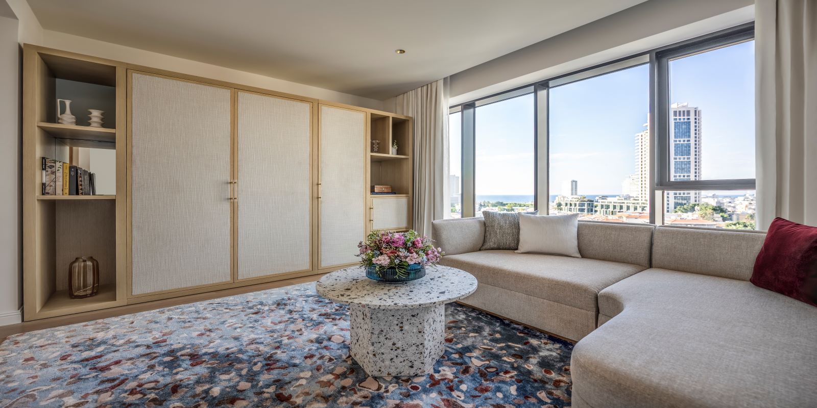 a living room with a couch and a table