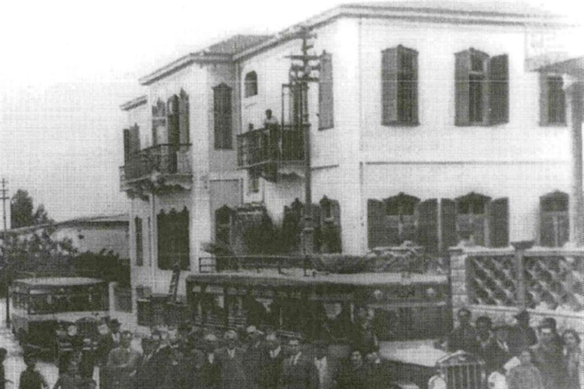 a group of people outside a building
