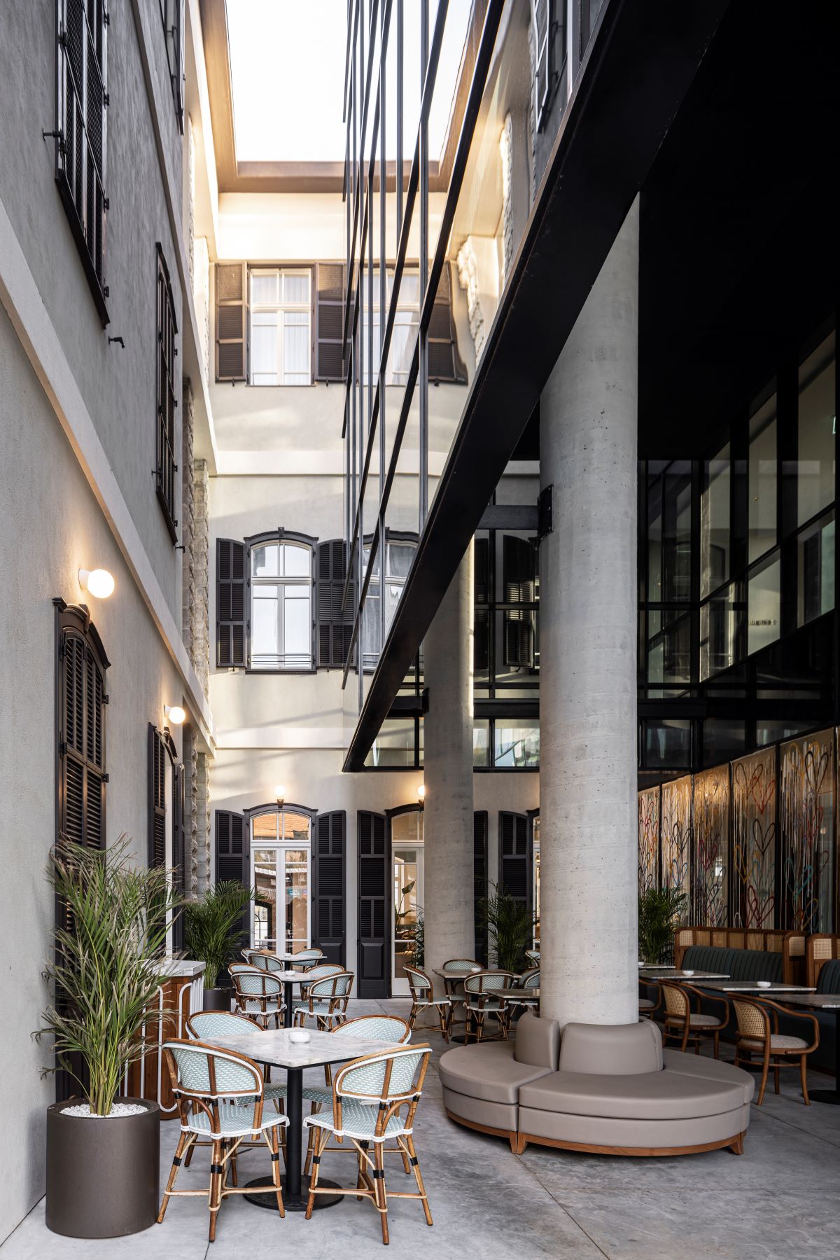 a building with a patio area and tables