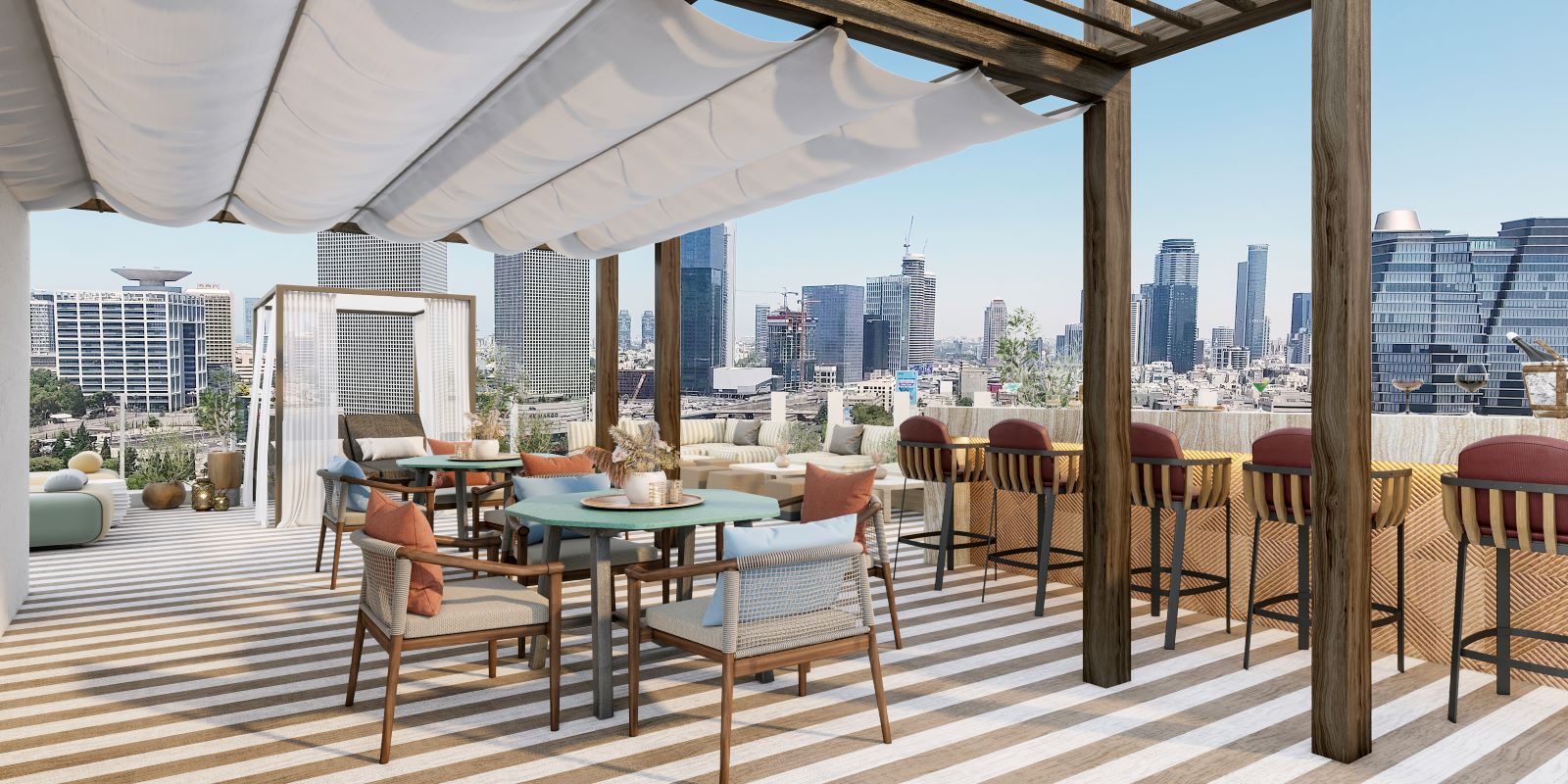 a rooftop patio with a large city skyline in the background