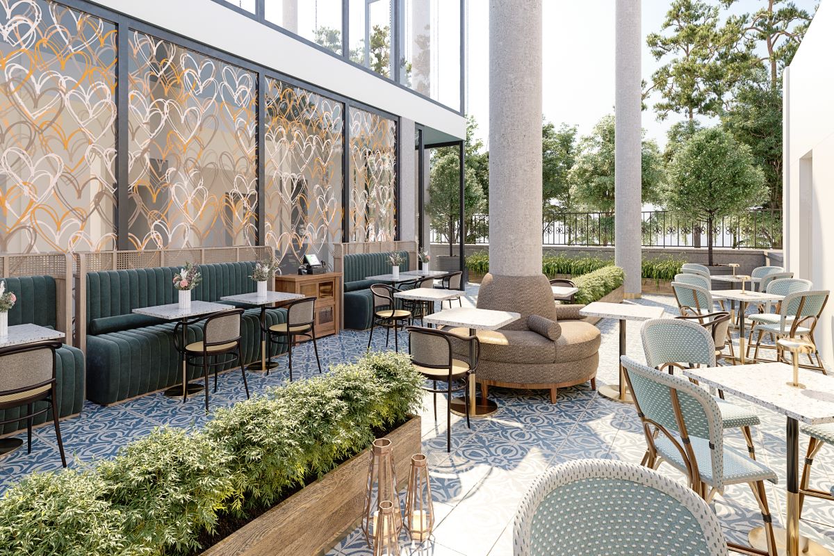a patio with tables and chairs