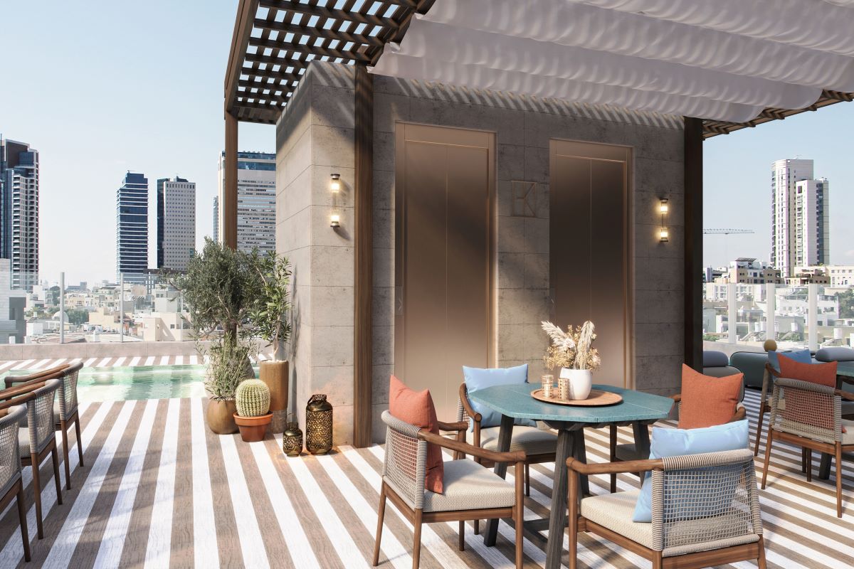 a patio with a table and chairs