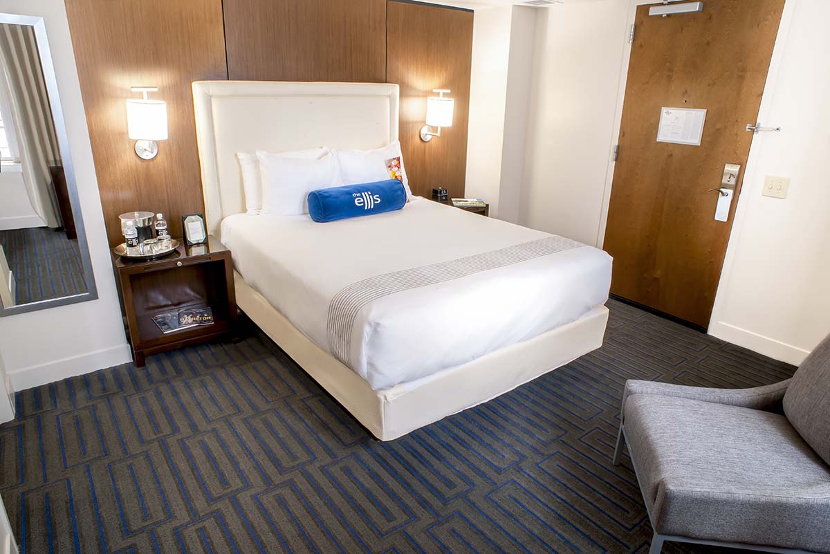 a bed in a hotel room