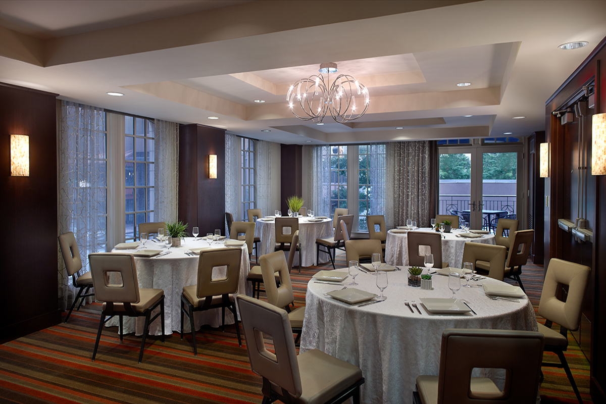a room with tables and chairs