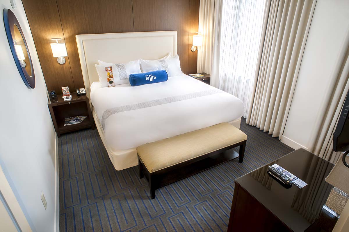 a bed in a hotel room