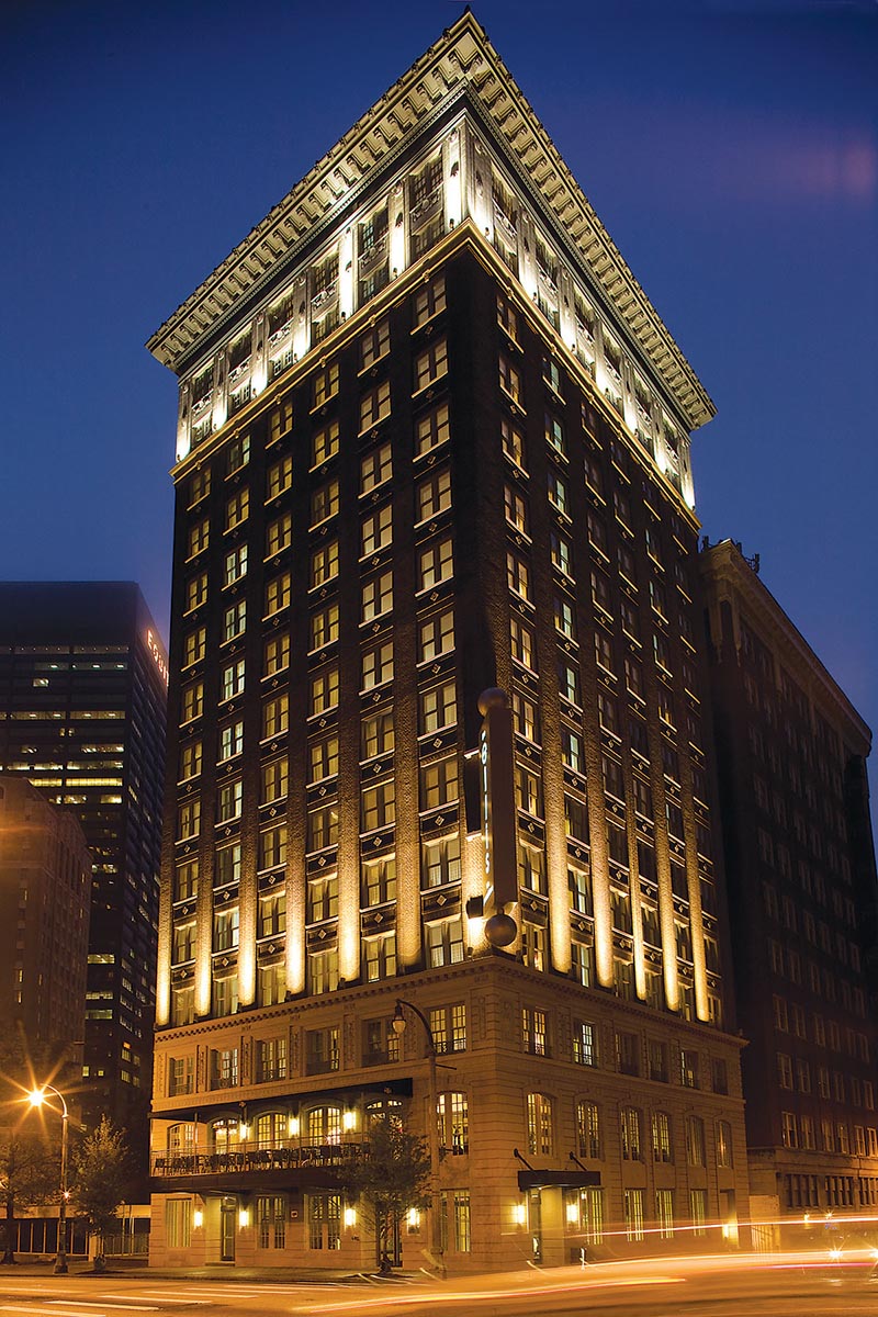 a tall building with lights on