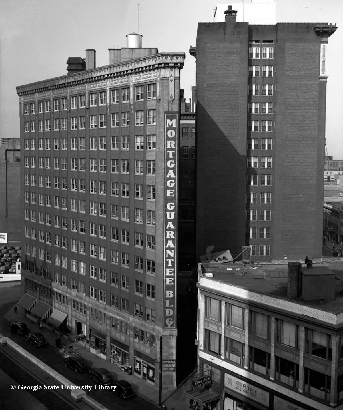 a tall building next to a street