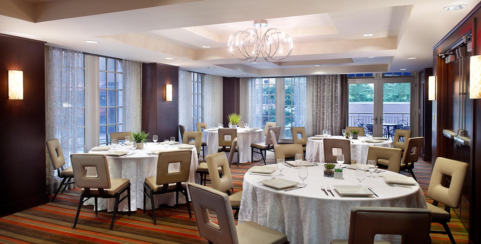 a room with tables and chairs