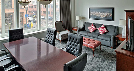 a room with a table and chairs